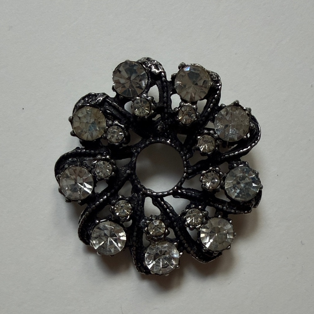 Elegant Black and Silver Brooch
